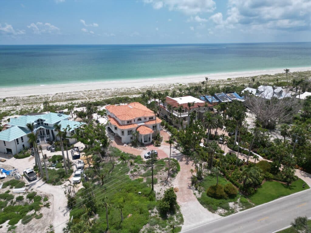 Installing tile roofs following Hurricane Ian in Siesta Key, Florida
