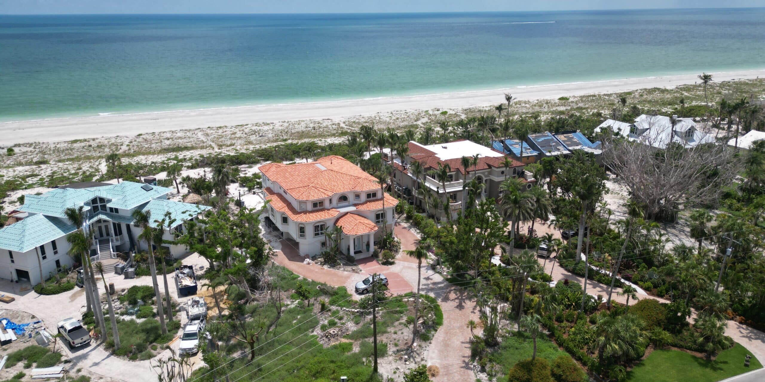 Installing tile roofs following Hurricane Ian in Siesta Key, Florida